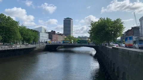 Modern Dublin TFI double decker bus is crossing bridge. Dublin, Ireland Stock Footage 252430665