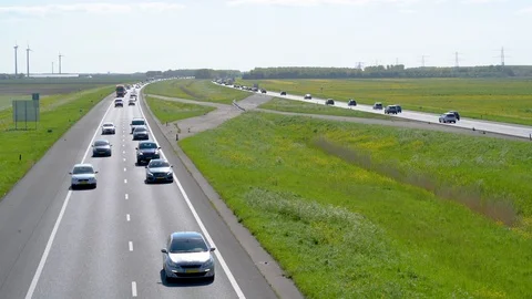 Modern dutch train passing in full speed Stock Footage 89408556