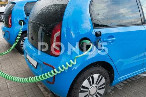 Modern electric car charging Stock Photos