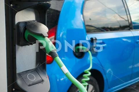 Modern electric car charging Stock Photos