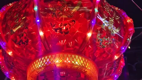 Modern Electric Chinese Lantern With Lights Spinning Like Disco Ball on Ceiling Stock Footage 334688035