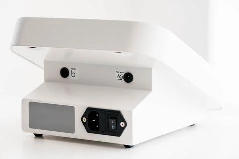 Modern Electric Device with Power Switch and Connector in Minimalist White .. 스톡 사진