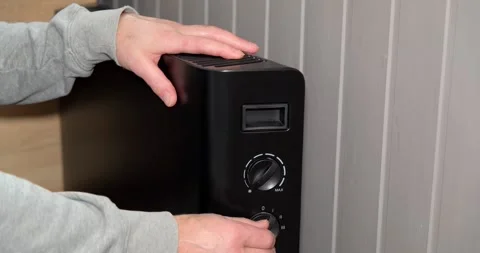 Modern Electric Heater with Adjustable Settings and Sleek Design, perfect for Stock Footage 315339326