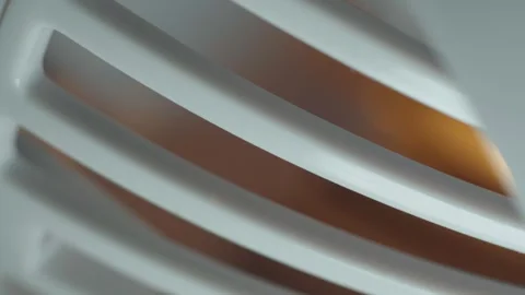 Modern electric ventilator close up macro on a wooden table in the living room Vidéo 245999308