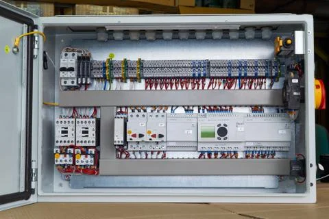 Modern electrical control Cabinet with controller and circuit breakers. Foto stock