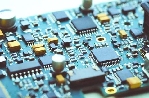Modern electronic board with microchips and electronic parts Stock Photos