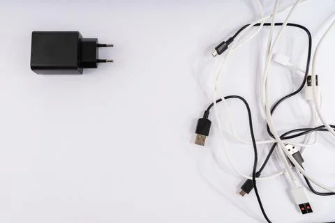 Modern Electronic Essentials: Black Power Adapter with Various USB Charging.. Stock Photos