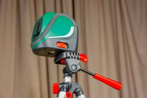 Modern electronic laser plane Builder is a real and irreplaceable assistant i Stock Photos