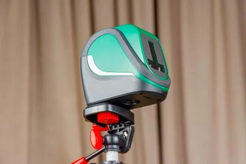 Modern electronic laser plane Builder is a real and irreplaceable assistant i Stock Photos