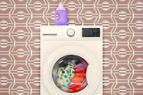 Modern electronic washing machine with rotating colorful laundry in front o.. Stock Photos