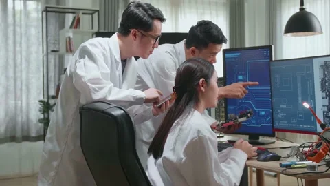 Modern Electronics Development Facility: Asian Team Of Multi Engineers, Stock Footage 160569304