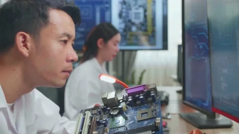 Modern Electronics Research And Development Facility: Asian Male Engineer Stock Footage 160564705