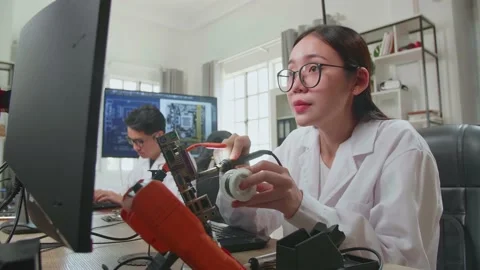 Modern Electronics Research And Development Facility: Beautiful Asian Female Stock-Footage 160566993