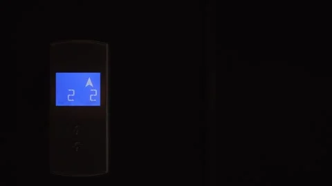 Modern elevator call button with LCD screen displaying elevator cabin floors. Stock Footage 255525974