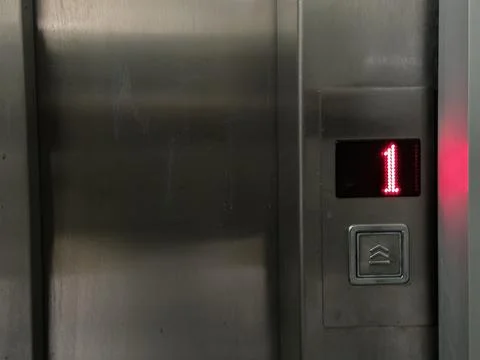 Modern Elevator Call Button with Red Digital Floor Display Foto stock