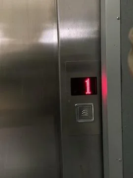 Modern Elevator Call Button with Red Digital Floor Display Stockfoto's