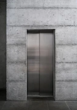 Modern elevator in concrete building Stock Photos