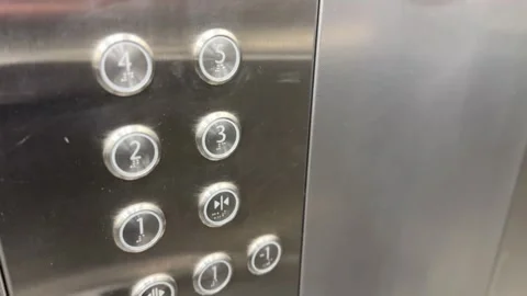 This is a modern elevator control panel that features a variety of buttons for Vidéo 316403709