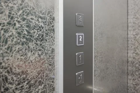 The modern elevator control panel features a display showcasing the current Foto stock