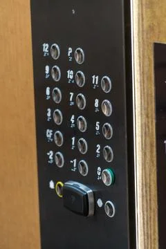 Modern elevator control panel with floor buttons and braille Stock Photos