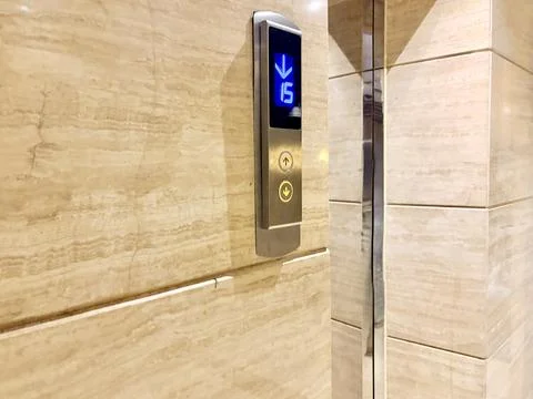 Modern Elevator Control Panel with Floor Indicator in a Building Lobby Фото