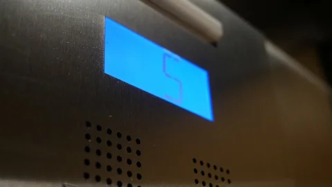 Modern elevator descends in contemporary building - screen angle Stock Footage 98268869