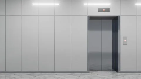 Modern elevator doors opening and closing in office building Stock Footage 310793520