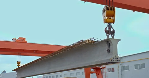 Modern elevator lifts a long concrete construction beam, modern construction Stock-Footage 158402747