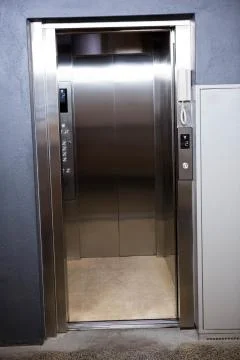 Modern elevator with open doors Foto stock