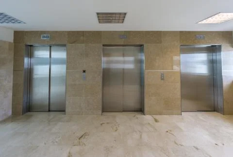 Modern elevators with closed doors 스톡 사진