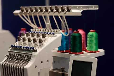 Modern embroidery machine with touch control panel Stock Photos