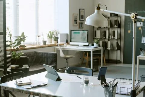 Modern Empty Coworking Space in Bright Open Office Interior Stock Photos