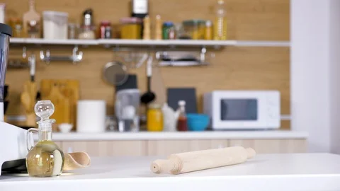 Modern empty kitchen with different cooking accessories Stock Footage 96503185
