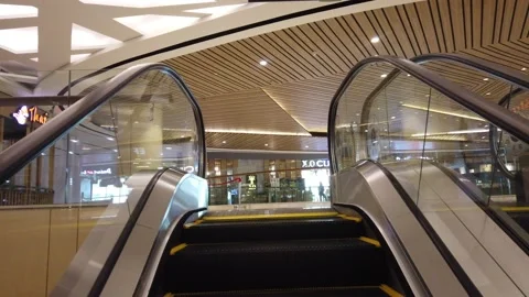 Modern Empty Working Escalator Going Up. 4K Ultra HD. Stock Footage 135865957