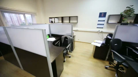 Modern empty workplaces with chairs, computers and papers Stock Footage 38163138
