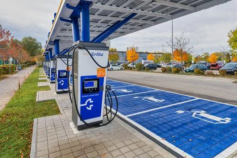 The modern EnBM e-mobilty charging station in the industrial park of Stock Photos