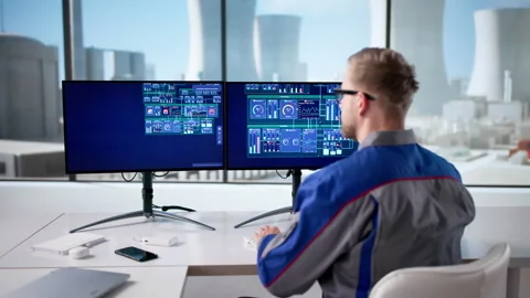 Modern Engineer Controls Nuclear Power Plant Stock Footage 328391137