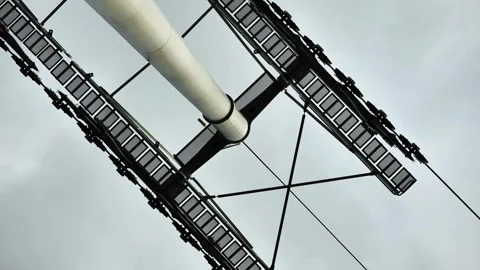 Modern engineering structure with solar panel array capturing energy on cloudy Stock-Footage 329566236