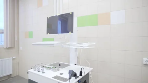 Modern ENT machine stands ready in tidy well-lit room Vídeo Stock 312407410
