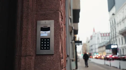 A Modern Entry Intercom System integrated into the facade of a contemporary Stock Footage 299474886