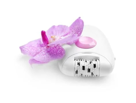 Modern epilator and orchid flower on white background Stock Photos
