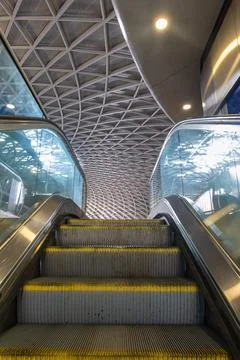 Modern Escalator in Architectural Space Stock Photos
