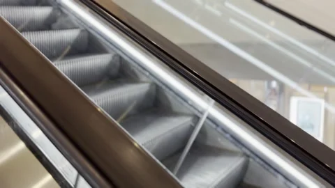 Modern Escalator in a Bright Indoor Space Stock Footage 343876126