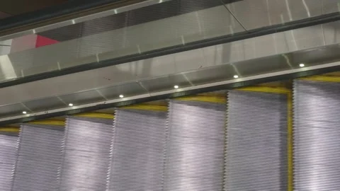 Modern Escalator Interior with Yellow Safety Lines Vídeo Stock 346472837
