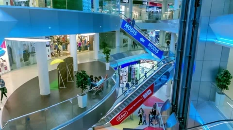 Modern escalator with a large hypermarket Stock Footage 63323144