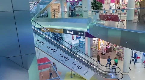 Modern escalator with a large hypermarket Stock Footage 63323193
