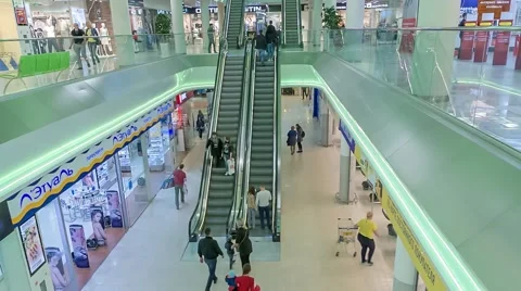 Modern escalator with a large hypermarket Stock Footage 63323224