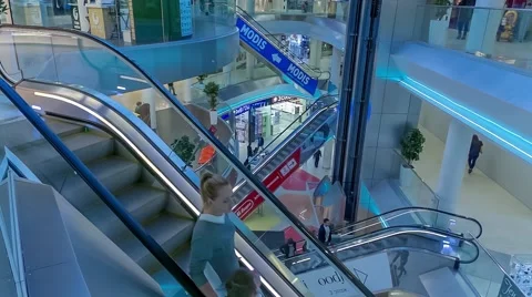 Modern escalator with a large hypermarket Stock Footage 63323241