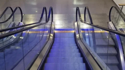 Modern escalators moving inside shopping mall in Varna Bulgaria November 2025 Stock Footage 322193135