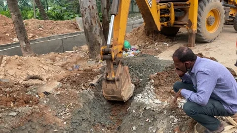 The modern excavator JCB performs excavation work on the construction site Video stock 163370375